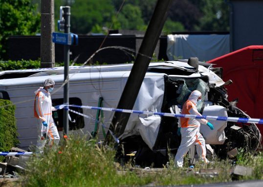 Four people killed after minibus collides with train in Belgium