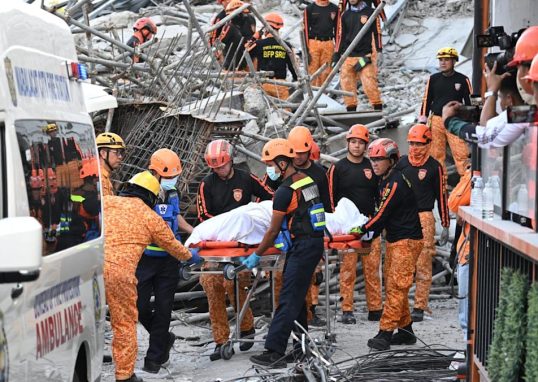 Malaysian man found dead, 20 still missing in Philippines building collapse