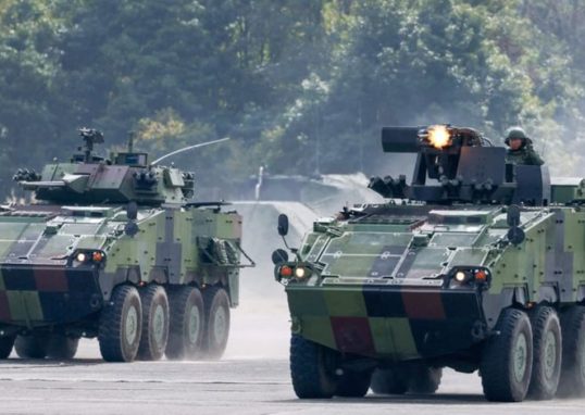 Hundreds rally in Taipei for defence spending after parliament cuts funds
