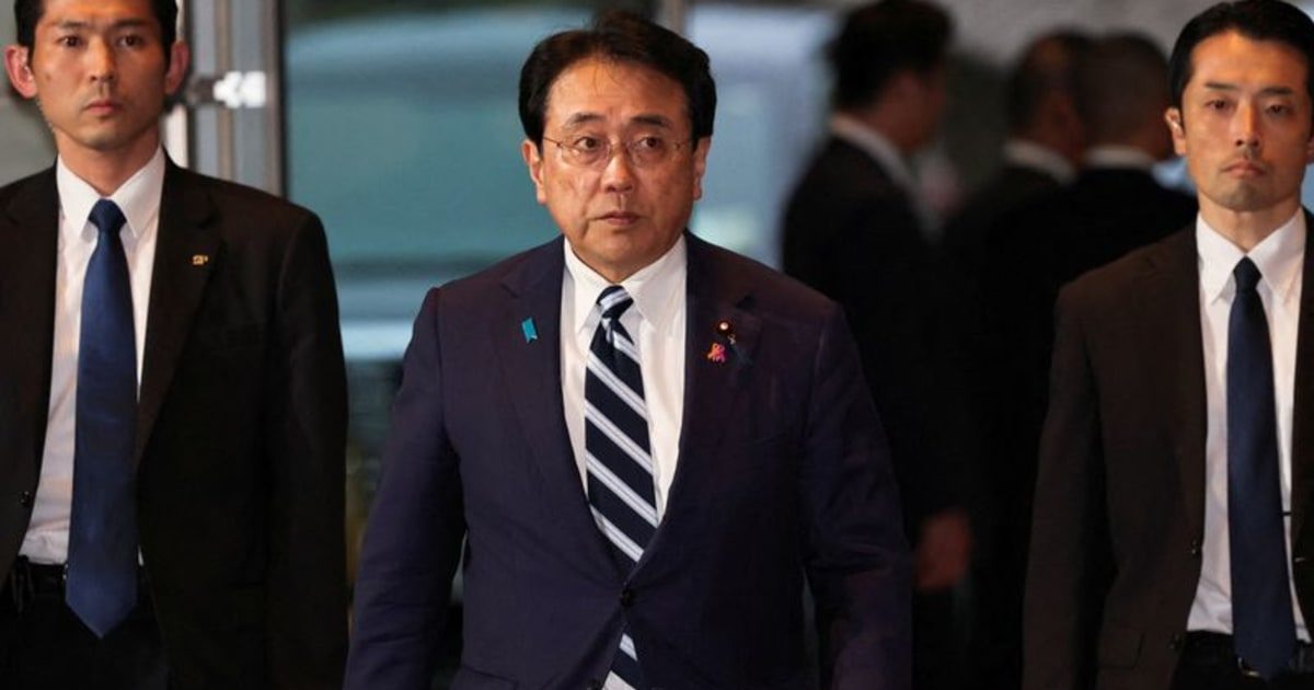 Japan trade minister holds brief talks with Chinese counterpart amid diplomatic row